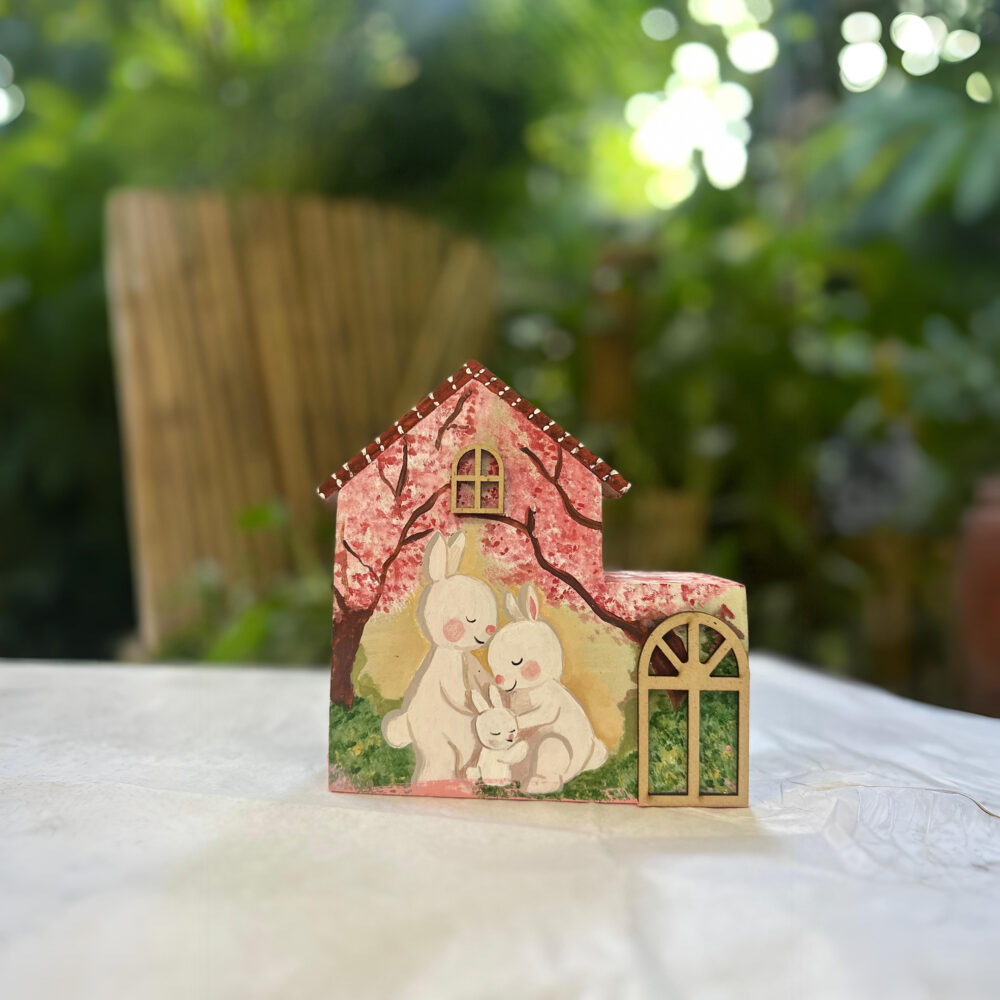 Handcrafted Wooden House with Bunny Family Design