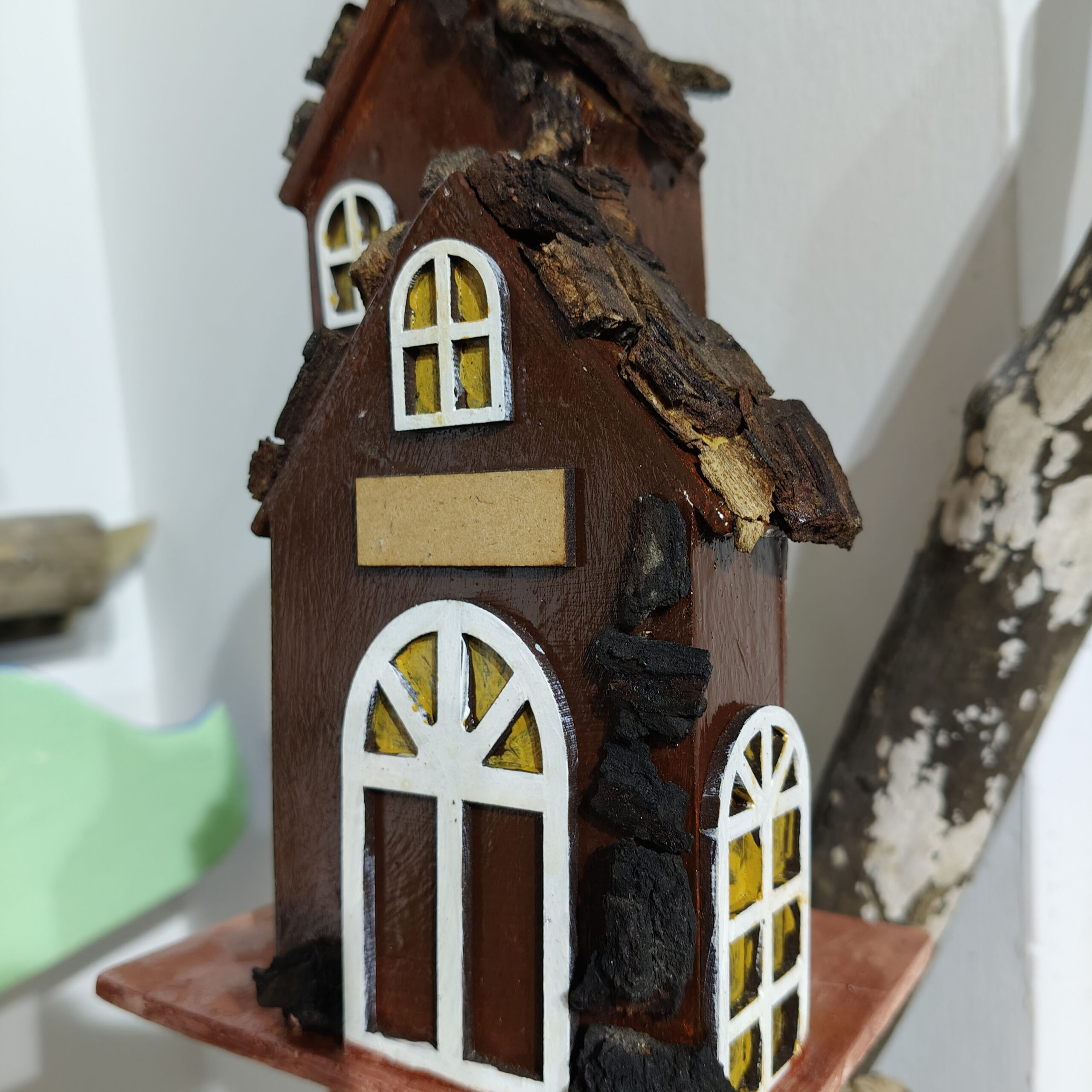 handcrafted wooden miniature house