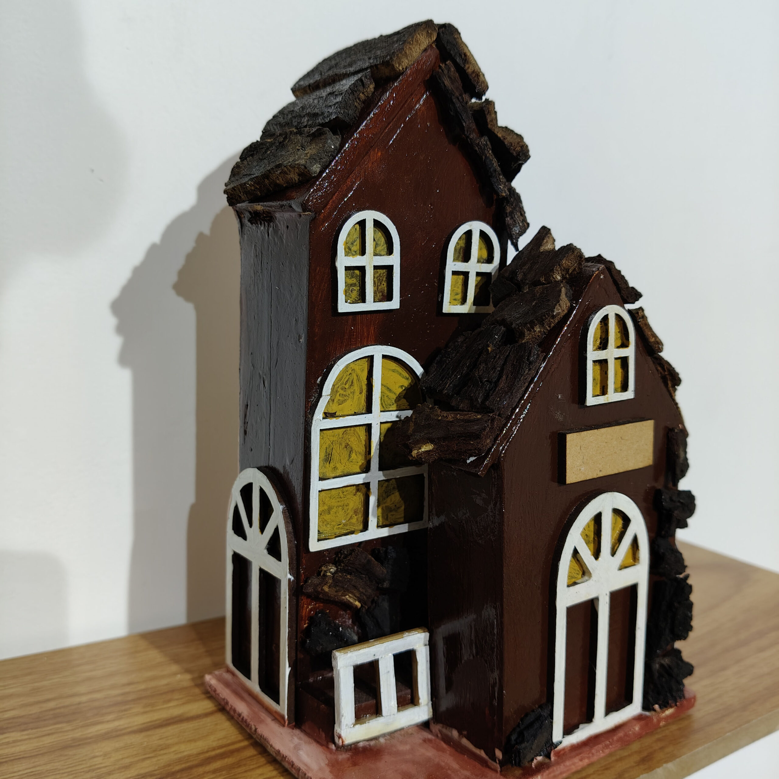 handcrafted wooden miniature house