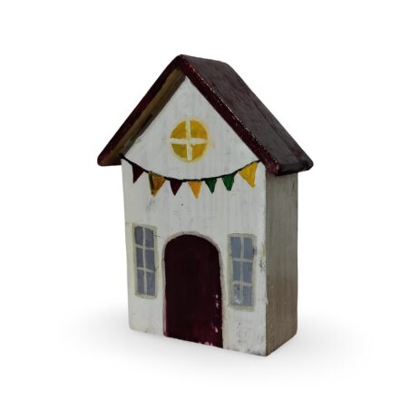 Handcrafted wooden miniature house with rustic white body